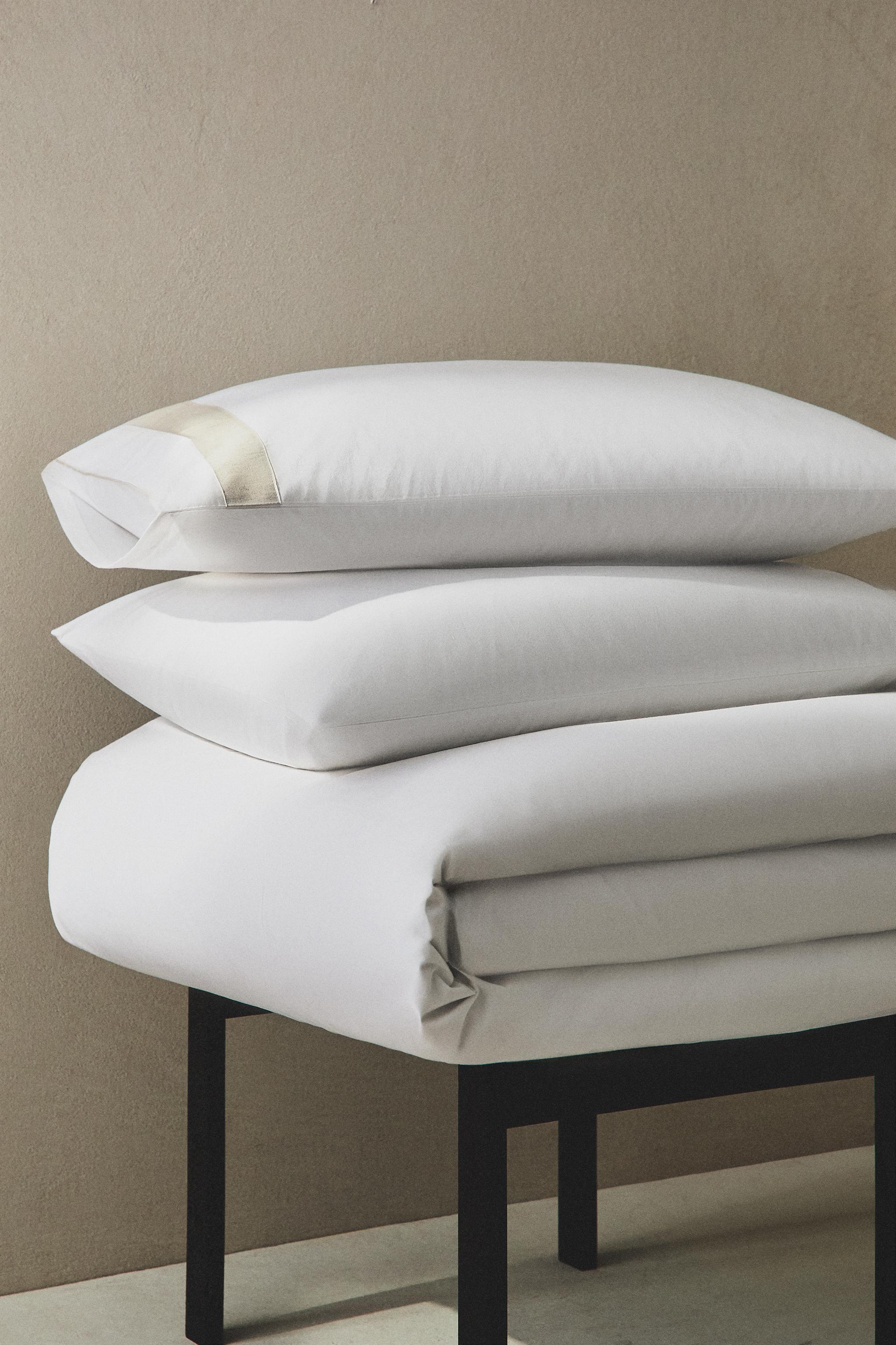 TAIE D’OREILLER COTON LISERÉ